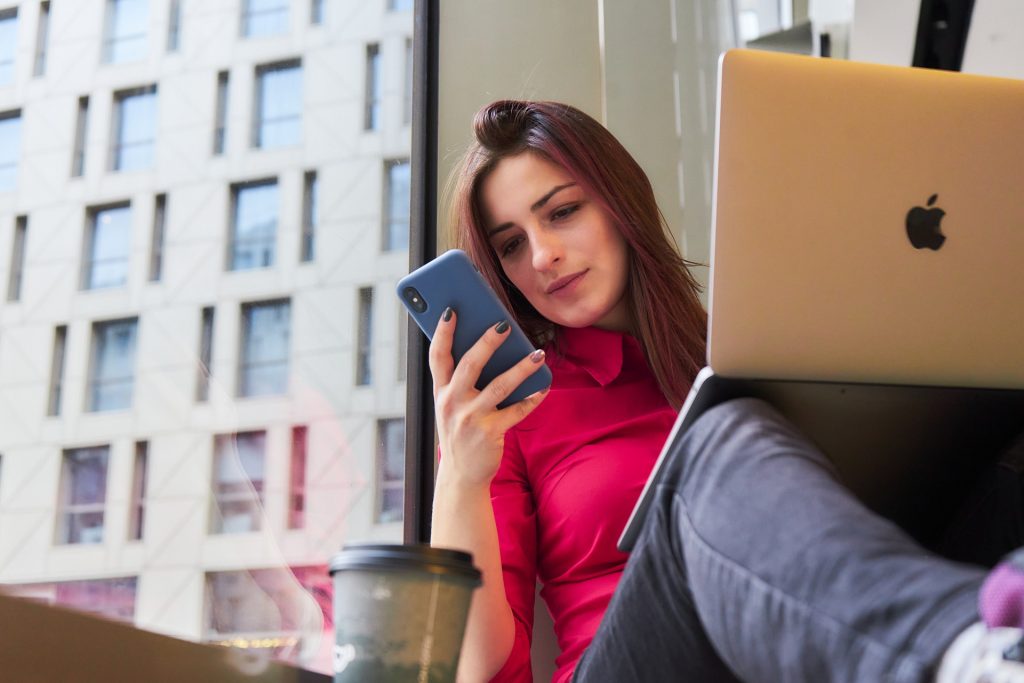 woman staring at cellphone